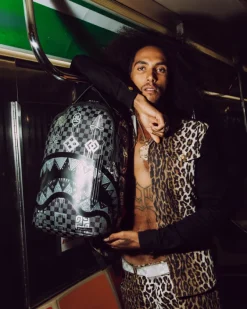 AFRICAN INTELLIGENCE 9 POWER GLYPHICS BACKPACK - SANDFLOWER COLLAB