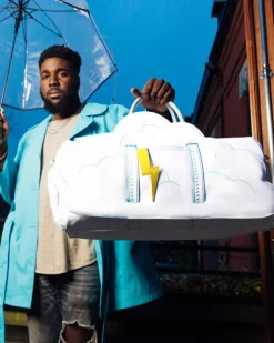 CLOUDY WITH A CHANCE OF SHARK DUFFLE