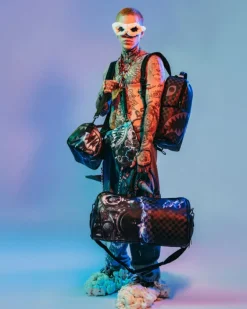 THE UNDERCURRENT CROSS-OVER CLUTCH